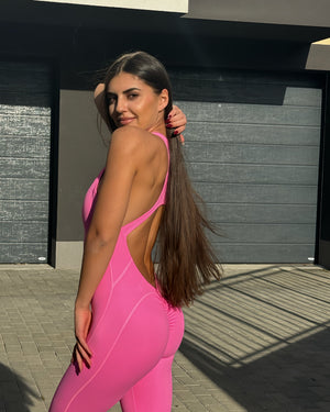 Дълъг спортен гащеризон с цип в розов цвят