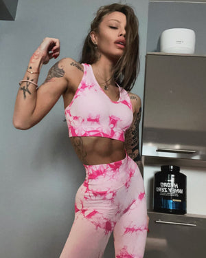 Спортен сет в мраморен розов цвят с оформящ ефект