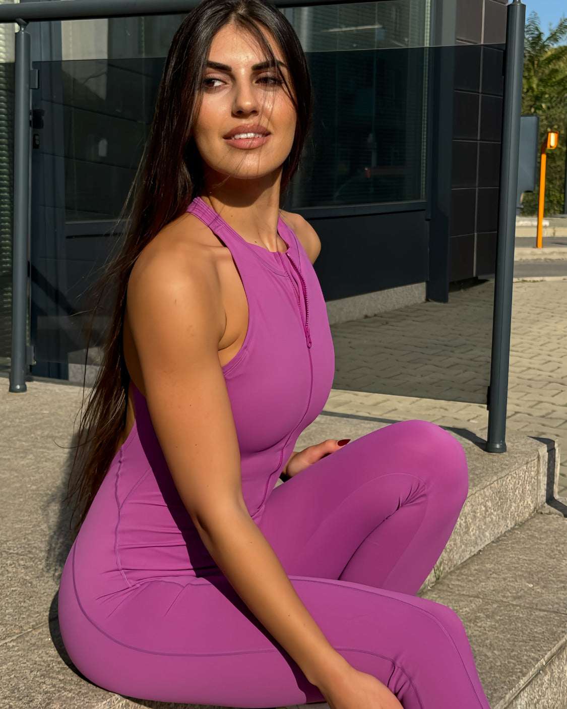 Дълъг спортен гащеризон с цип в син цвят